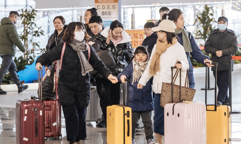 Hành khách tại sân bay quốc tế Đại Hưng Bắc Kinh, Trung Quốc, ngày 26/1. Ảnh: Global Times